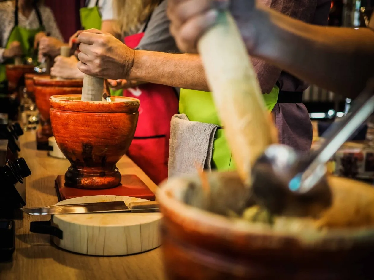 Interns in Bangkok Preparing Thai food at a Cooking Tour